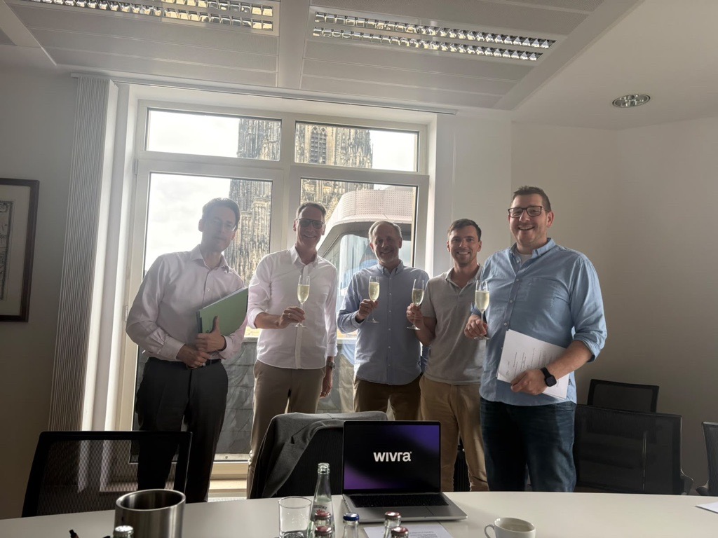 The wivra team toasting the establishment of wivra GmbH